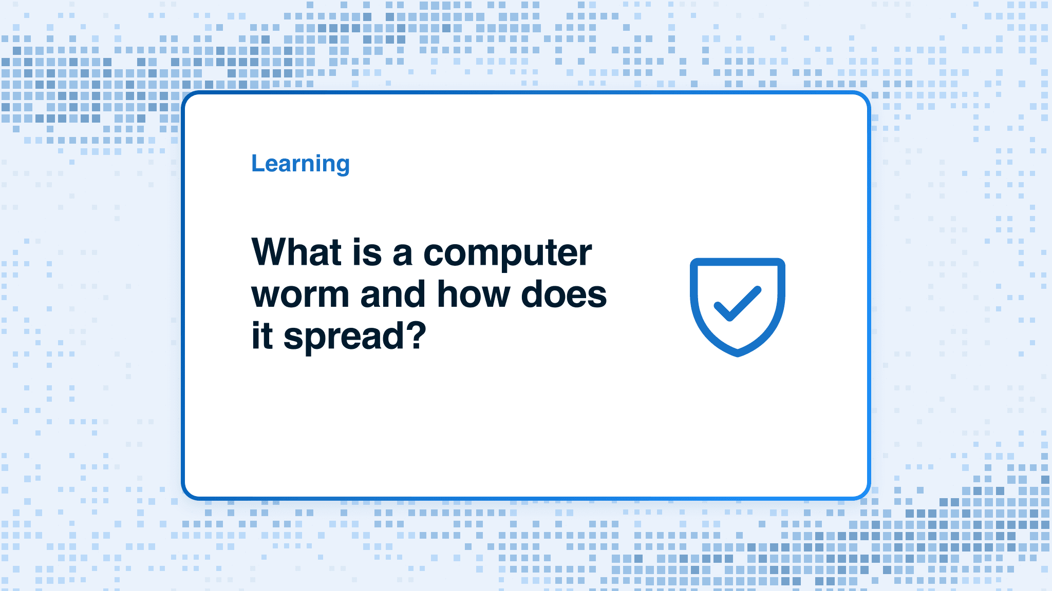 What is a computer worm and how does it spread?