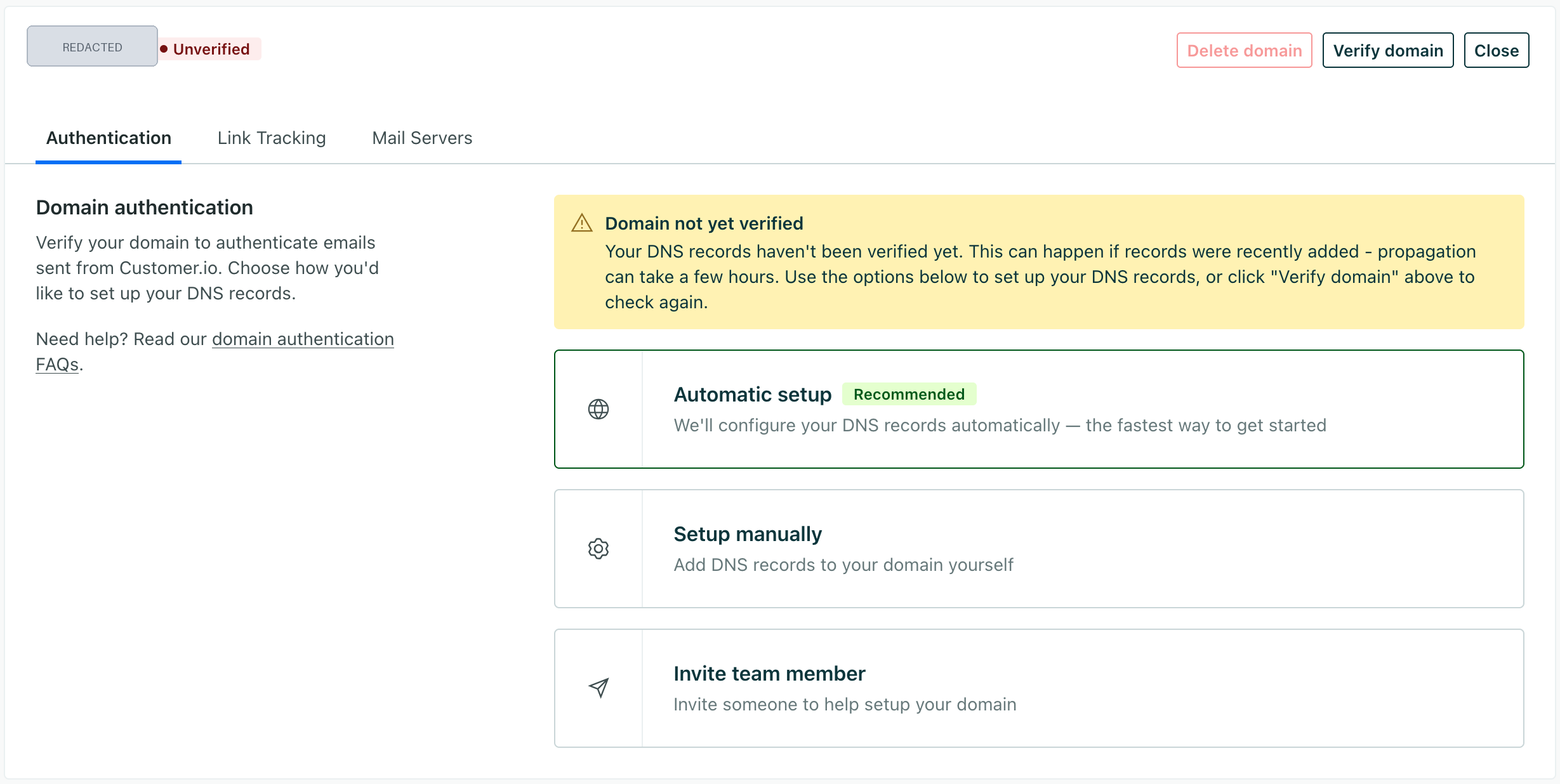 Customer.io domain authentication page showing Automatic setup, Setup manually, and Invite team member options.
